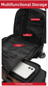 Detail view of multi-compartment interior for men's chest bag with USB port