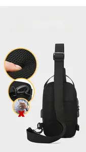 Detail of breathable mesh back padding and adjustable shoulder strap on black chest bag