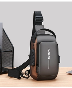 Detail of anti-theft chest bag featuring a security combination lock and external USB port