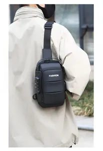 Detail view of black waterproof chest bag with anti-theft lock and fashion text
