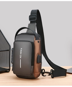 Detail of anti-theft combination lock and USB charging port on men's gray chest bag