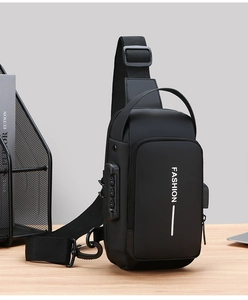 Detailed view of the anti-theft combination lock and USB charging port on the black sling bag