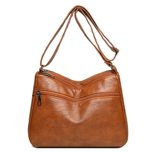 Brown vintage faux leather crossbody bag with multiple zip pockets and adjustable strap