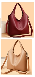 Detail of pebbled leather texture on minimalist hobo tote bags with metal hardware