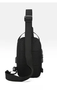 Detail of ergonomic breathable mesh back panel and USB port on black men chest bag