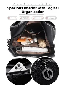 Detail view of large black lychee leather tote with internal compartments for tablet