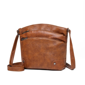 Vintage brown multi-layer bucket bag with triple zippers and faux leather texture