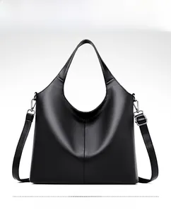 Detailed front view of black lychee grain leather hobo shoulder bag with silver hardware