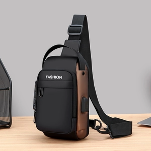 Waterproof crossbody bag with anti-theft lock, USB charging port and brown leather accents
