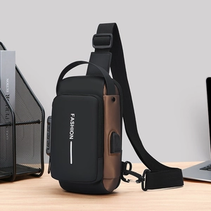 Waterproof crossbody chest bag with USB port and anti-theft lock in black and brown