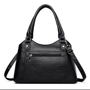 Classic black PU leather tote bag with large capacity and adjustable crossbody strap