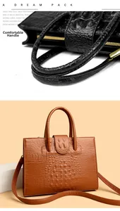 Detail of comfortable handle and crocodile texture on brown and black tote bags