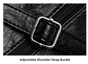 Détail de la boucle réglable en argent sur un sac cabas en cuir grainé noir avec fermeture