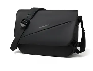 Close-up of black waterproof messenger bag featuring MOVE TO FUTURE print and zipper