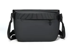 Waterproof crossbody bag back view with luggage strap and hidden zipper pocket
