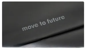 Close-up of move to future slogan print on waterproof black fabric of messenger bag