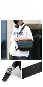 Detail of wide 3D honeycomb breathable shoulder strap and swivel buckle on crossbody bag