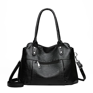 Retro black faux leather large tote bag with silver zippers and adjustable shoulder strap