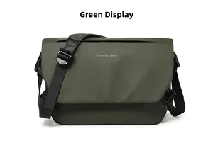 Detail view of military green waterproof messenger bag with move to future print