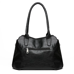 Vintage black textured faux leather tote bag with rear zipper pocket and double handles
