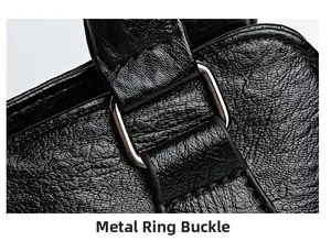 Close-up of durable silver metal buckle and premium black pebble grain leather texture