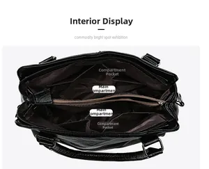 Overhead view showing organized interior compartments and brown lining of a black tote bag