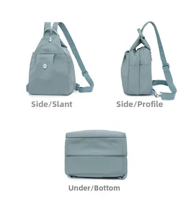 Three-way view showing the side and bottom of a teal blue lightweight nylon backpack