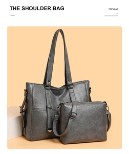 Détail du grand cabas en cuir PU gris et sa pochette assortie avec texture vintage