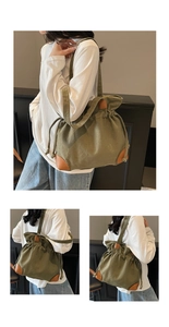 Détail du sac fourre-tout en toile vert olive avec bordures en cuir brun et cordon de serrage