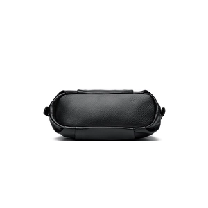Bottom view of large capacity black leather handbag with premium lychee grain texture