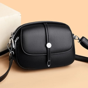 Schwarze Crossbody-Tasche aus Leder mit Lychee-Muster, silberner Schnalle und Klappverschluss