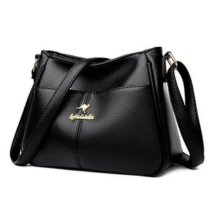 Minimalist black lychee textured leather crossbody bag with gold kangaroo logo emblem