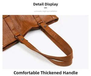 Détail des poignées épaisses et des rivets métalliques sur un sac à main marron