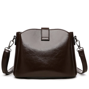Dark brown high-gloss oil wax leather bucket bag with top strap and metal hooks