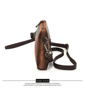 Side view of retro brown faux leather envelope crossbody bag with adjustable shoulder strap