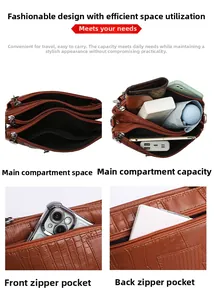 Detail showing the large capacity of a brown crocodile leather clutch with three zip layers