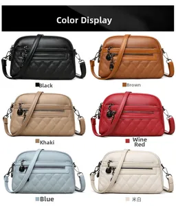 Collection of textured leather shell bags in six colors with quilted patterns and metal zippers