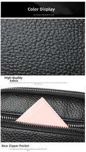 Detail of black lychee grain leather handbag featuring a secure back zipper pocket