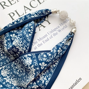 Navy blue silk scarf with floral patterns and silver rhinestone magnetic buckle