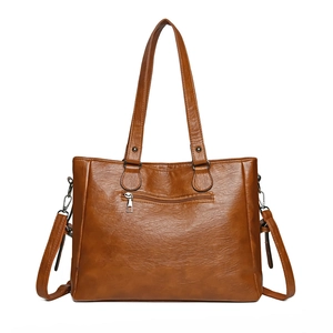 Sac fourre-tout en cuir marron avec doubles poignées et bandoulière réglable