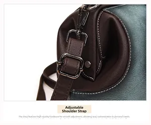 Detail of adjustable shoulder strap with premium metal buckle on brown leather handbag