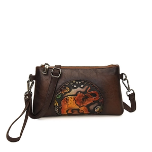 Retro dark brown envelope bag with elephant embossed pattern and adjustable straps