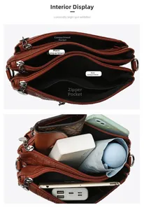 Detail of brown embossed PU envelope bag with multiple zippers and large capacity storage
