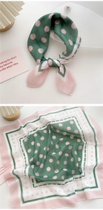 Detail of polka dot square scarf with dark green and pink stitching for styling