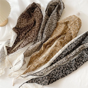 Vintage floral cotton linen scarf with lace trim shown in a stylish four-color collection