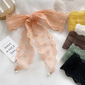 Long lace ribbons with floral embroidery and pearl pendants in six assorted colors