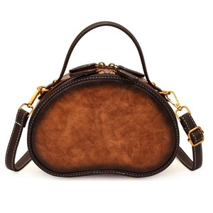 Retro brown leather semi-circle handbag with adjustable strap and contrast stitching