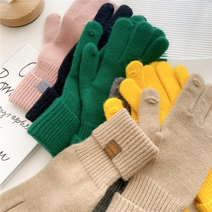 Winter thermal knit gloves in multiple colors featuring ribbed cuffs and soft acrylic blend