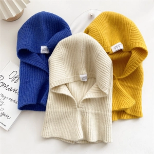 Knitted hooded scarf in multiple colors featuring vertical ribbing and trendy design