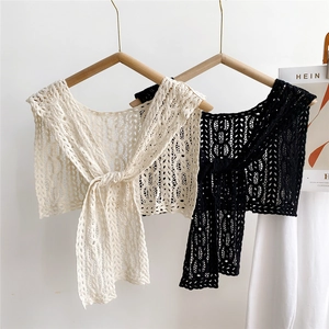 Elegant hollow lace crochet shawl in beige and black with long ties for summer styling
